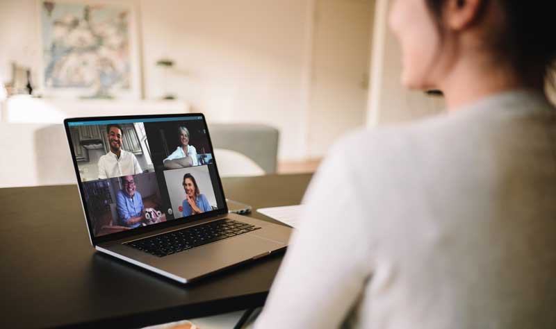 Virtual assistant meets with team for meeting on video call